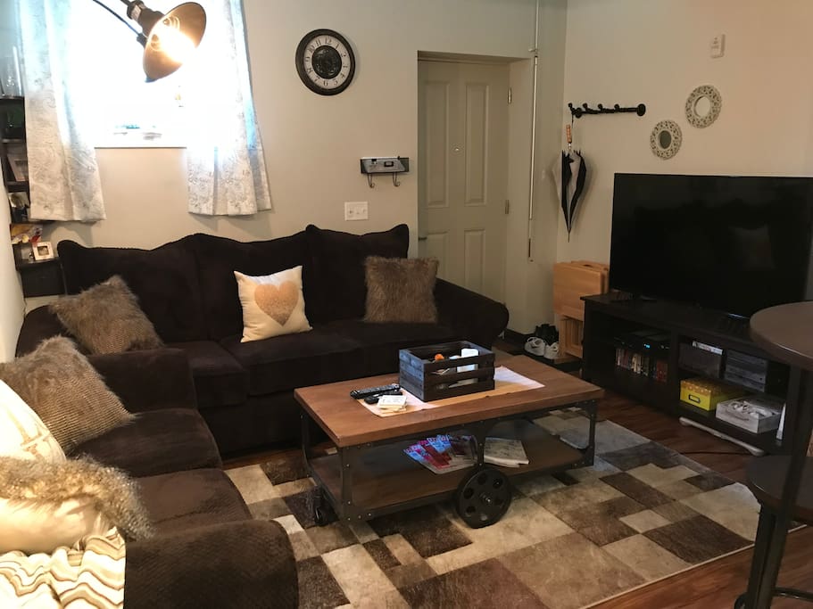 Living Room-Includes wi-if, home phone and cable. 55” television, Wii, DVD player with access to all movies/games. Extra wide couch and loveseat can sleep an additional 2 comfortably.