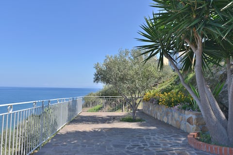 Comfortable beach house with private parking.