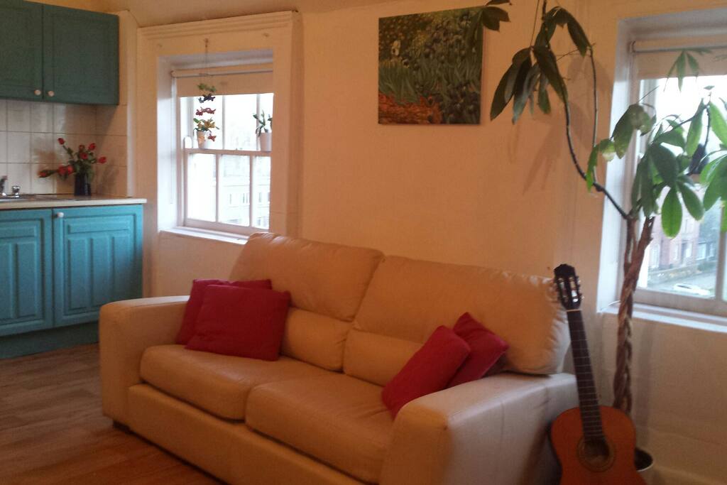 Open plan sitting room and kitchen
