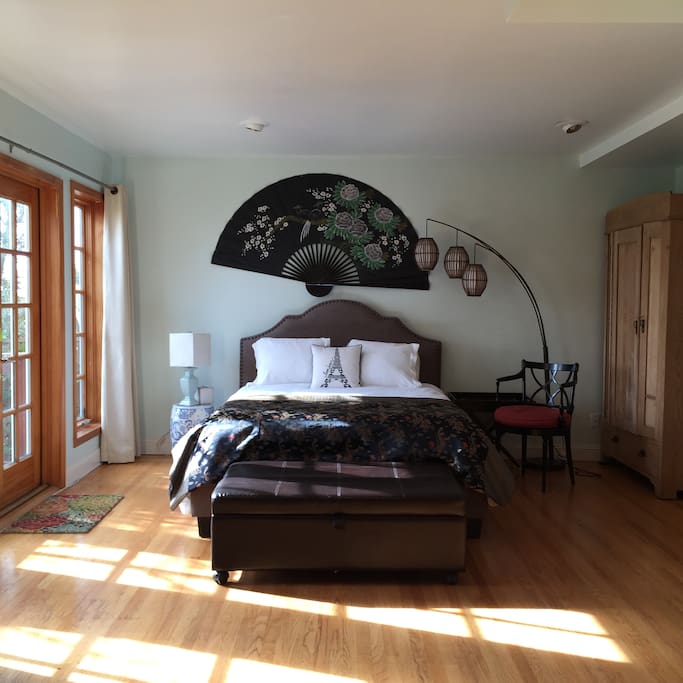 Private room with Queen bed and Twin bed ottoman.