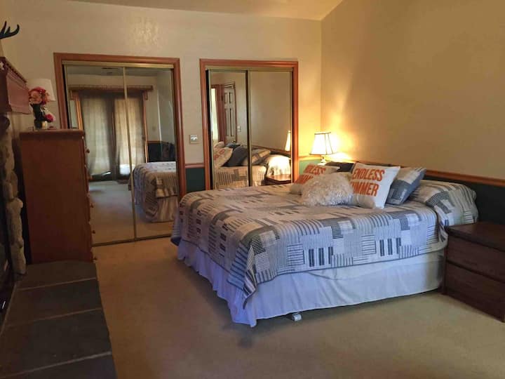 Main Bedroom, King size bed.  with electric fake fireplace.  