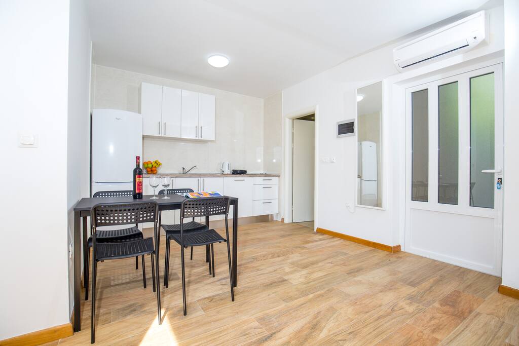 Open floor plan consists of a bright living room...