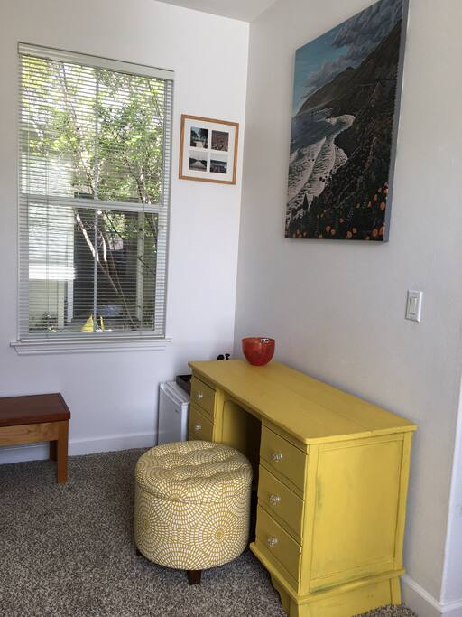 Desk and WIFI. Small fridge with electric kettle.