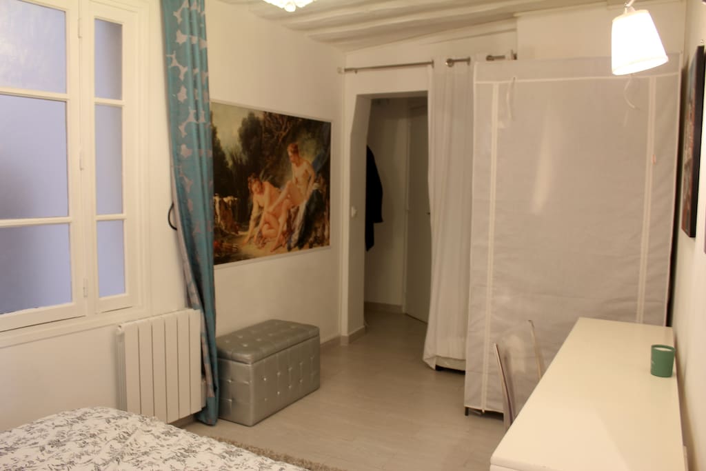 Room and view of hallway entrance.