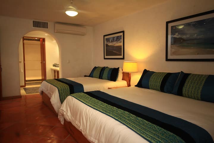 bedroom with a queen and king sized bed and HUGE bathroom/closet