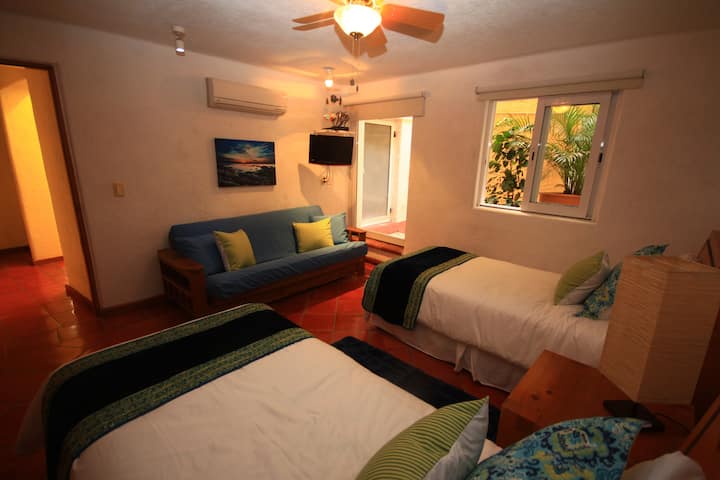 Bedroom with 2 twin sized beds and a pull out. Perfect for kids! Also has a bathroom!