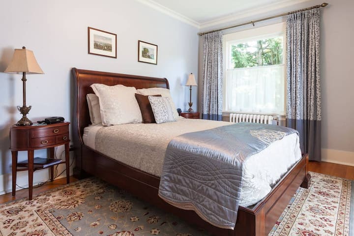 Bedroom 3 (Deerholme) with silver-blue hues, Queen size bed and lovely artwork      Upper level