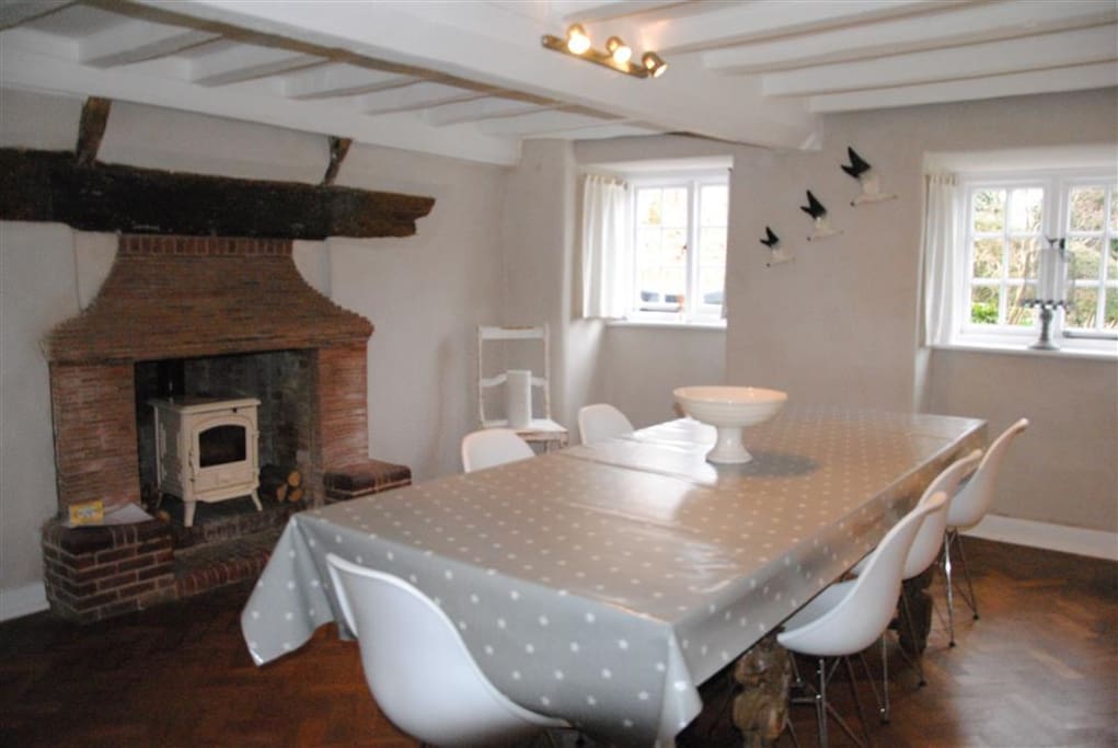 Dinning Room, easily seats 10, lovely white log burner