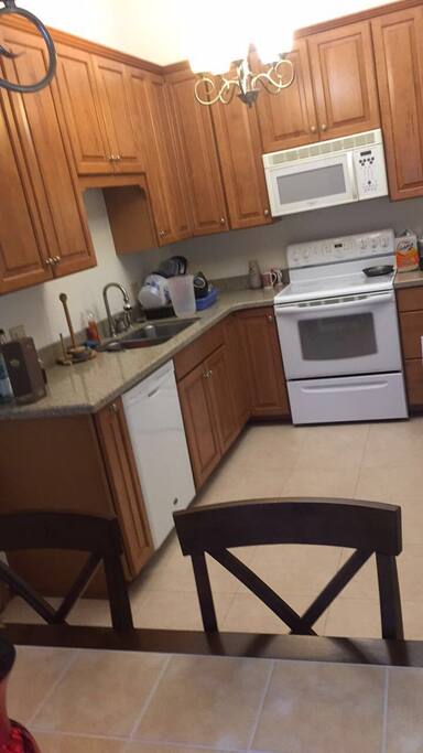 Kitchen area microwave , dish washer and electric stove