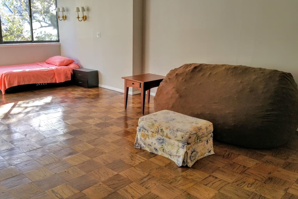 Large bean-bag sofa and ottoman footrest.