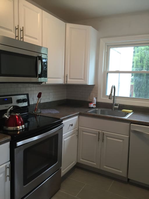Fully renovated kitchen, stocked with coffee, tea and a french press for guests.