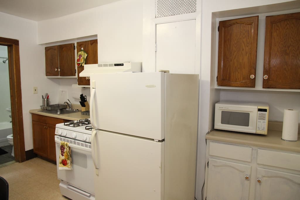 Microwave and full refrigerator