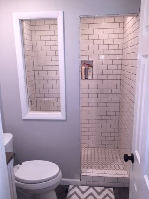 Walk in Master Shower complete with rain shower head.