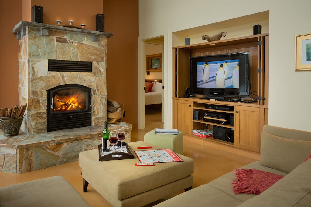 Cozy winter evenings with a wood burning fireplace, games and movies on Cable TV.