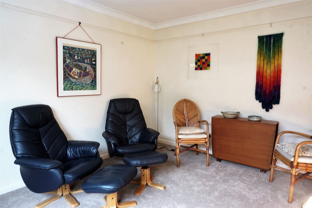 Living/Dining room: Curl up in the comfy chairs to read a book, watch TV or a movie.