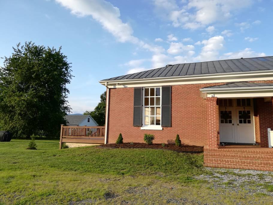 This listing includes the entire left side of the building along with lawn, grill, and deck on left side.