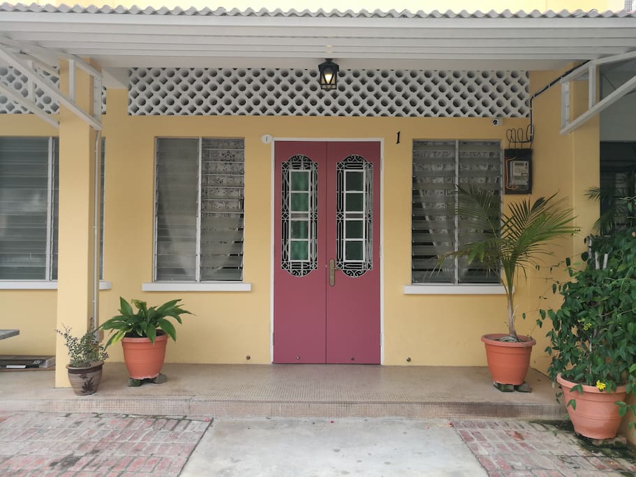 The main feature of the house is its red door , styled in 1960s