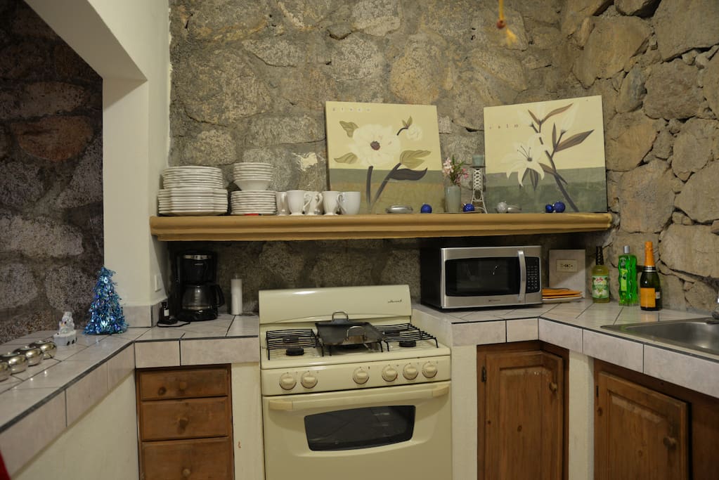 Kitchen, coffee maker (coffee and water included) microwave, stove