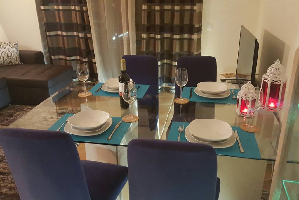 Living room with dinner set table to a memorable meal