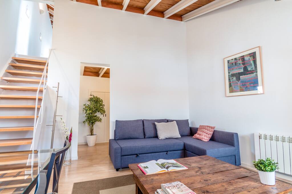 Salón - comedor con sofá cama doble