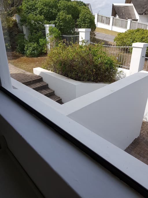 Outside stairway towards front door.