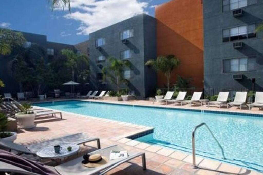 Pool area with jacuzzi.