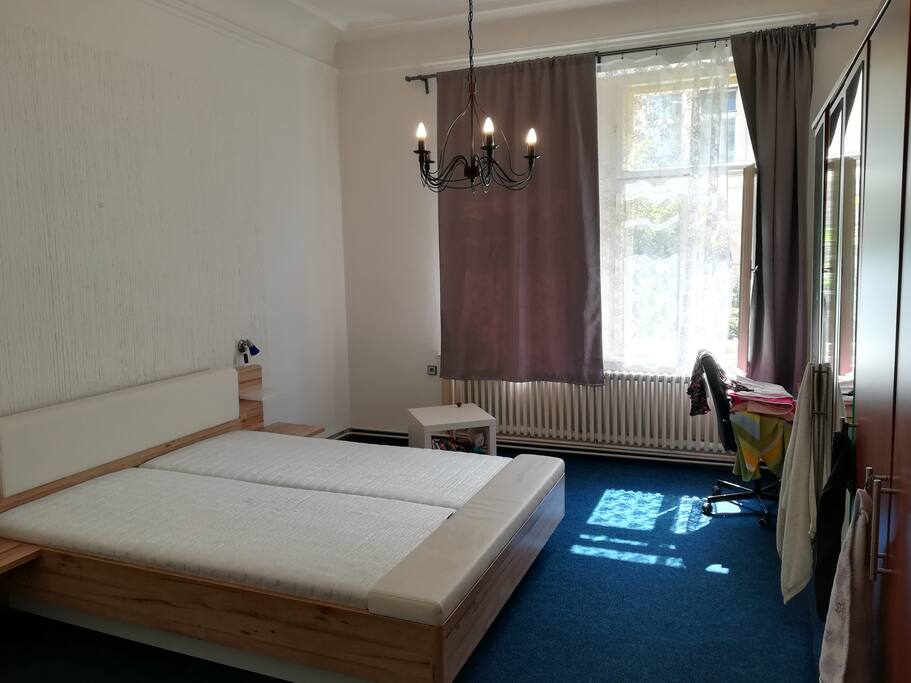 Queen size bed in first bedroom