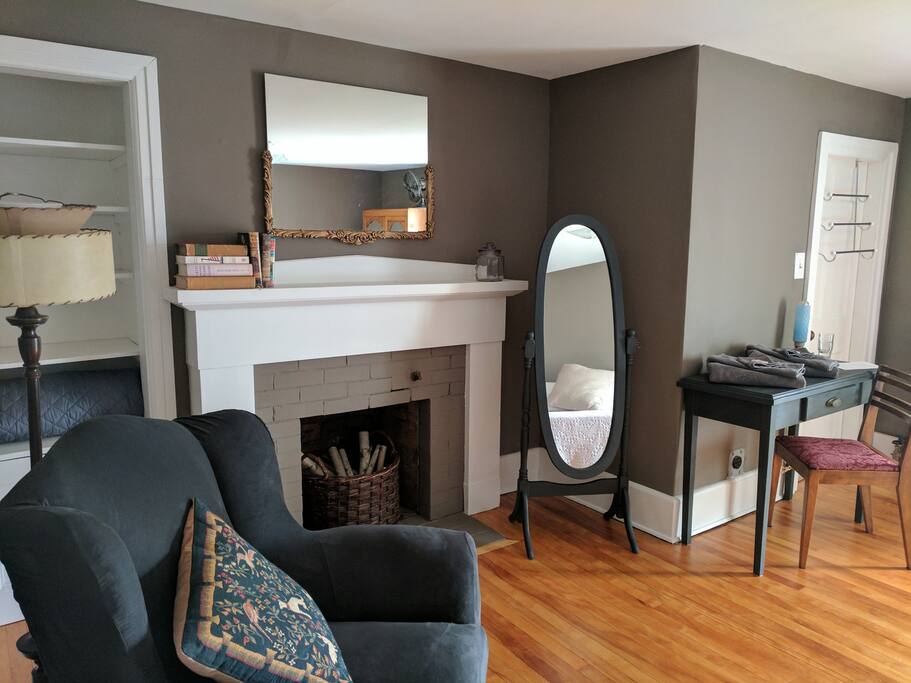King Suite fireplace and a comfy chair to curl up in