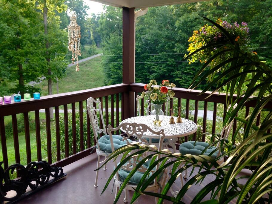 Front porch seating area. Very private! Smoking is allowed out on the porch.
