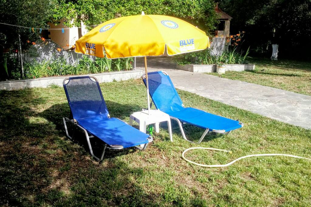Sunbeds on our garden. Enjoy the sun