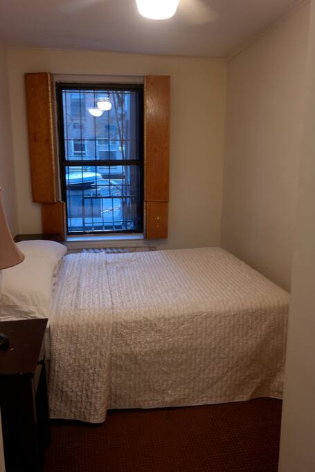 Here is the bedroom with a queen-size bed. A dresser and 2 closets are also in this room.