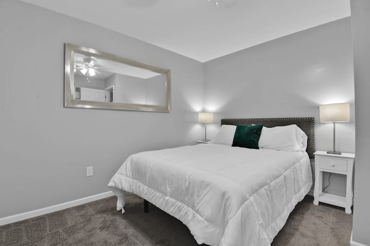 Guest bedroom 2 furnished with Queen DreamBed Lux Cooling Memory Foam Mattress on adjustable base. 