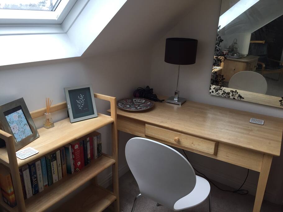 If you have to work in the evening, there is a desk but this can also be used as a dressing table. A hairdryer is provided. If you wish to read, we have provided you with a small library of books.