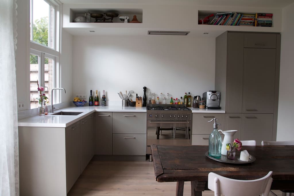 Kitchen fully equipped with 5-pit stove, oven, fridge, dishwasher
