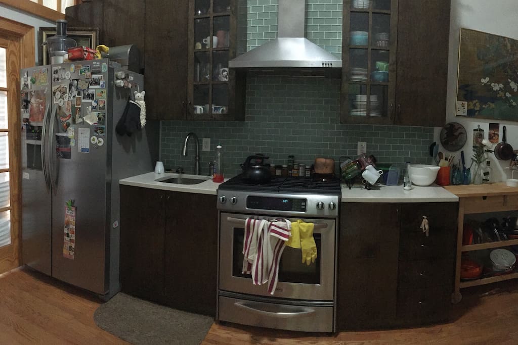 Full recently renovated kitchen, large fridge, dining table (not pictured)
