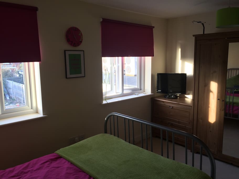 A comfortable double room with plenty of storage