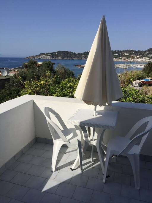 Terrace with views of the port and the bay