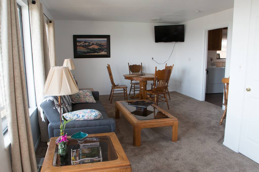 Living Room with dining table in back