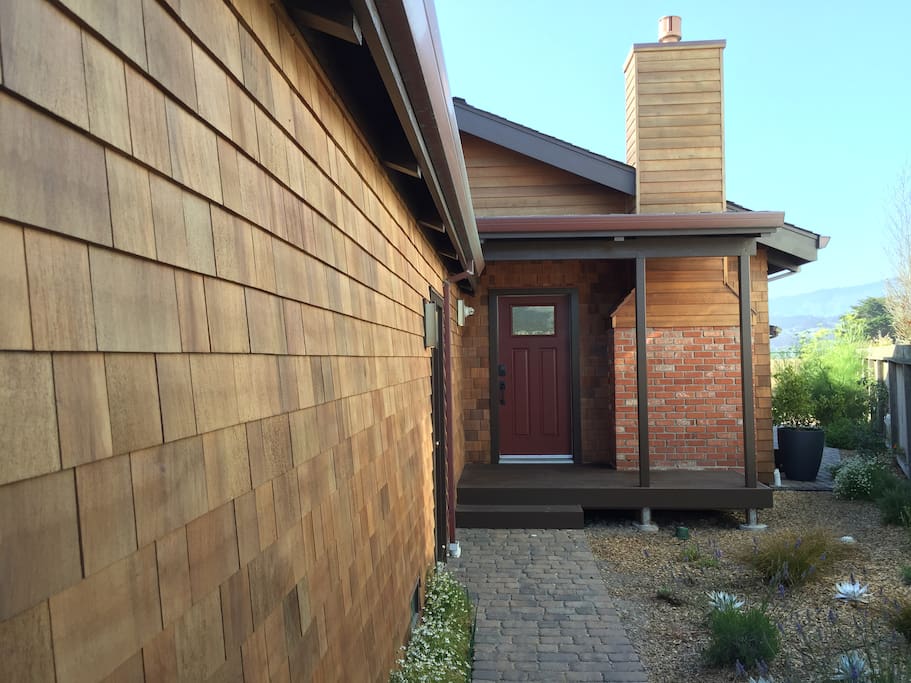 The entrance is secluded and set back next to the garage and very private.