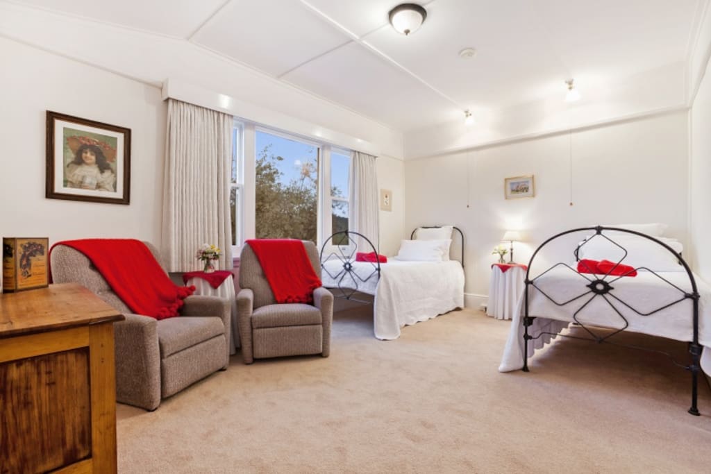 Room One Alice -family room sleeps 4. King configure to singels