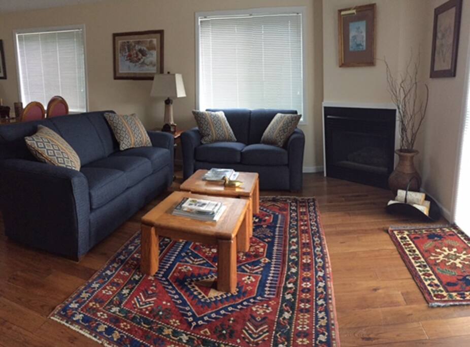 Living Room with Gas Fireplace and Deck Access