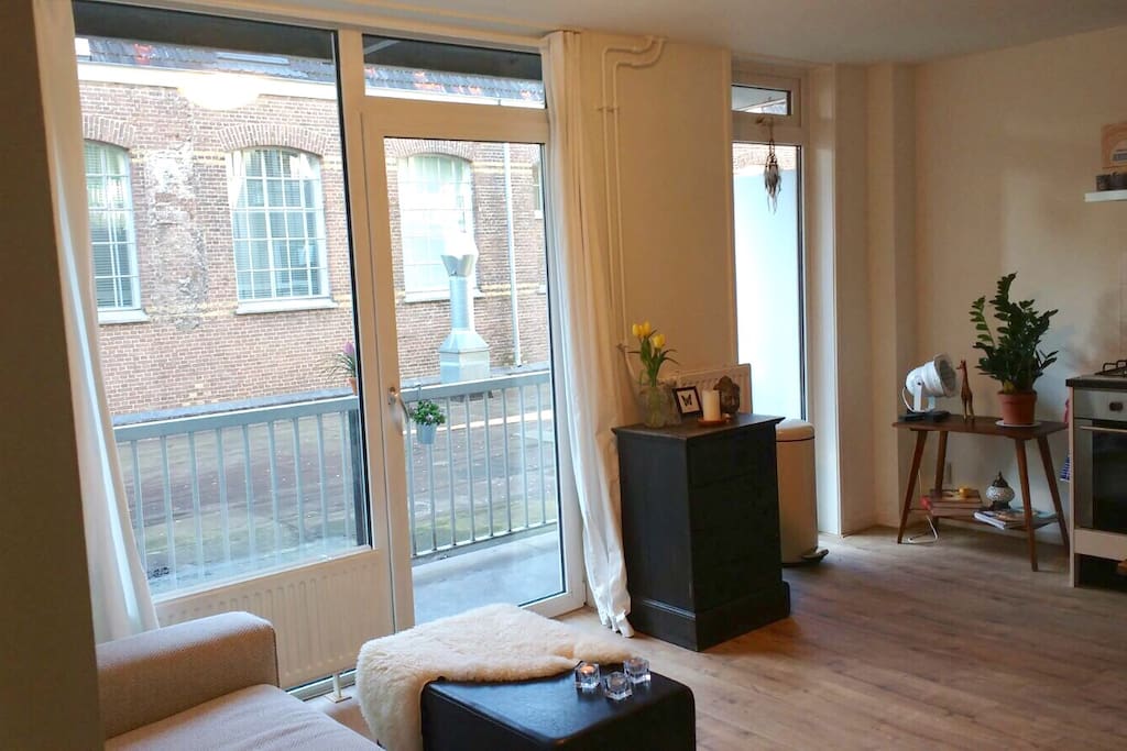 Light living room with balcony