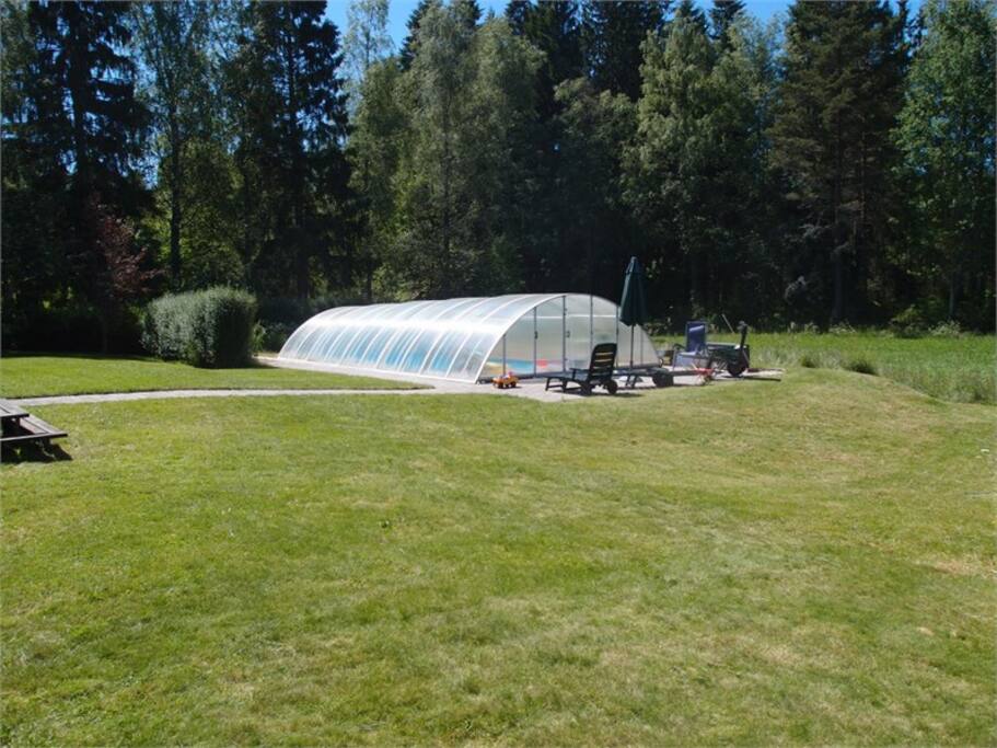 Swimming pool and gardens.