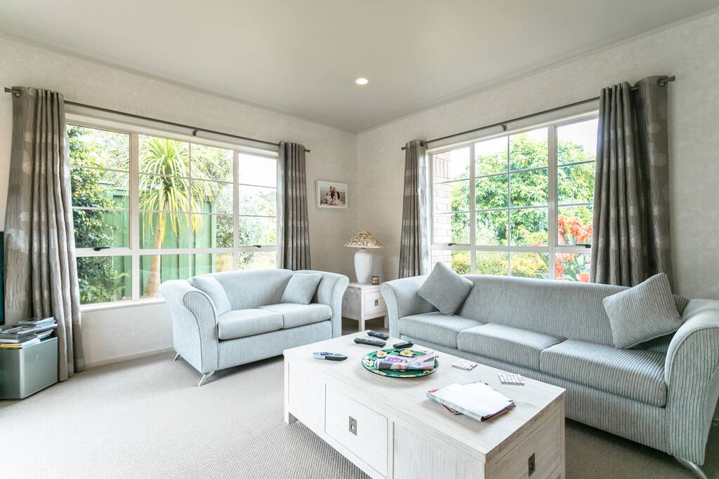 Spacious lounge area with large screen TV with sky available.