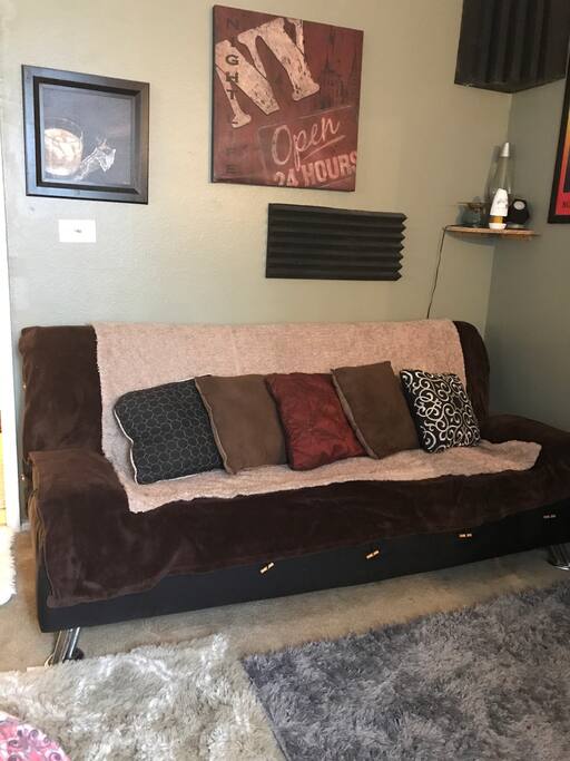 Full Size Futon. We have bedding.