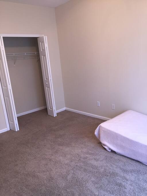 Bedroom with spacious closet and Twin bed.
