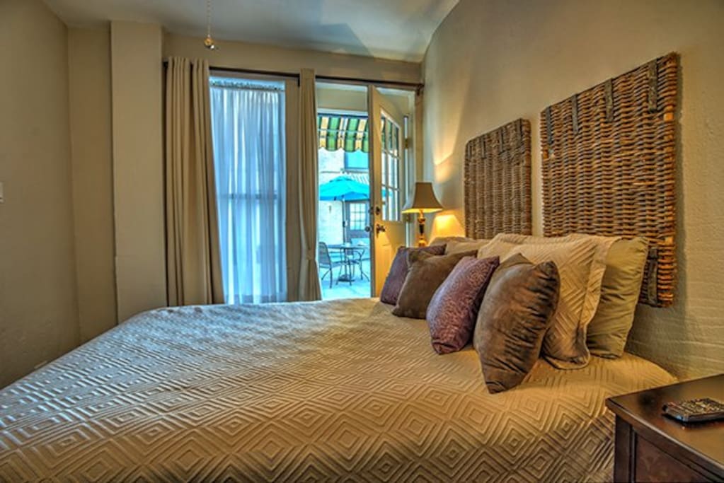 Bedrooms opens to courtyard yet has privacy drapes. Queen Bed. Full bath with tub/shower.