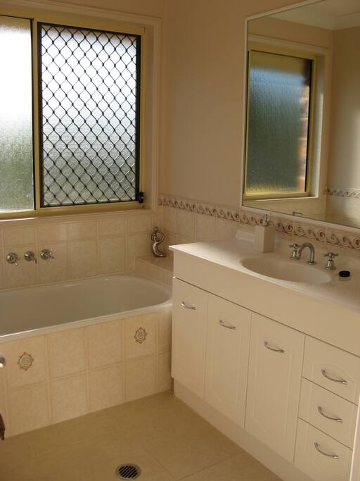 Full sized and well equipped private bathroom.
