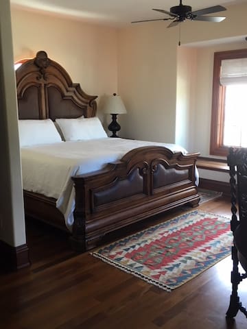 Private bedroom in luxury bay front home