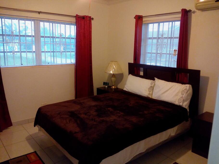 Queen Size bed with TV